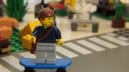 LEGO_Minifigure_skating_through_town
